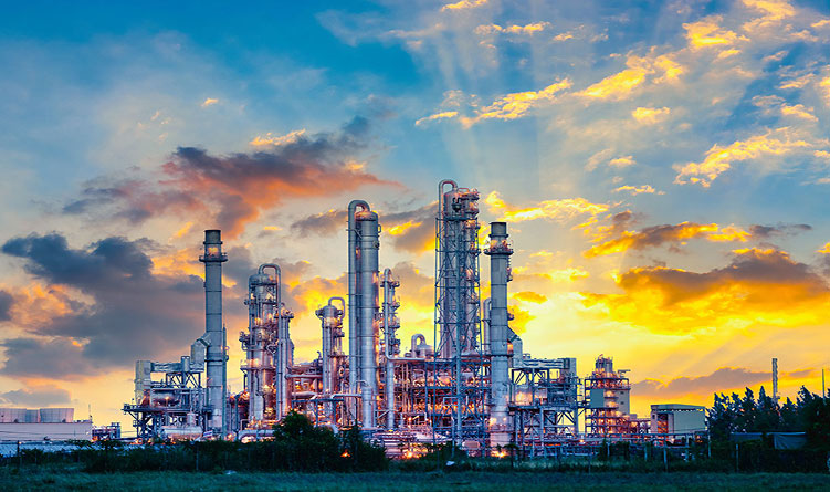 Industrial manufacturing plant at sunrise with nice landscaping