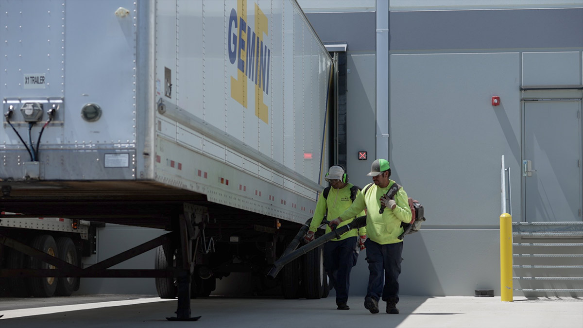 Blowing leaves away from a loading dock